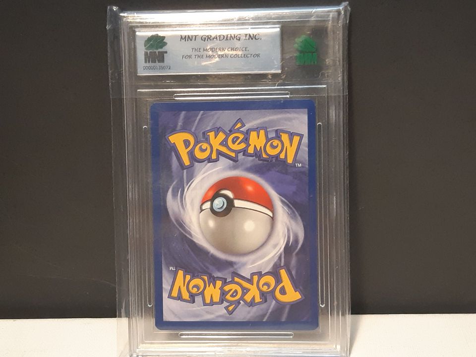 1st Edition Jungle Spearow graded 8.5