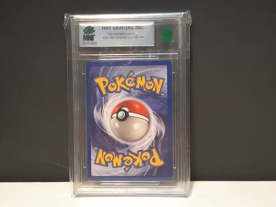 1st Edition Jungle Meowth Graded 8.5