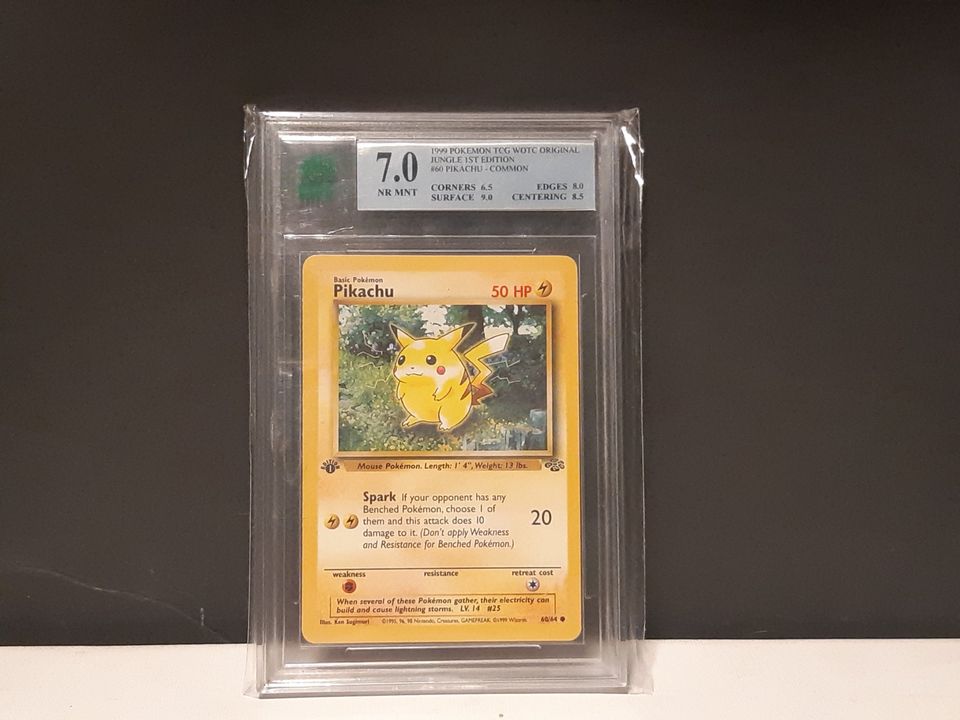 1st Edition Jungle Pikachu Graded 7